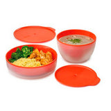 Second view of the double-walled Joseph Joseph M-Cuisine cool-touch microwave bowl in stone and orange