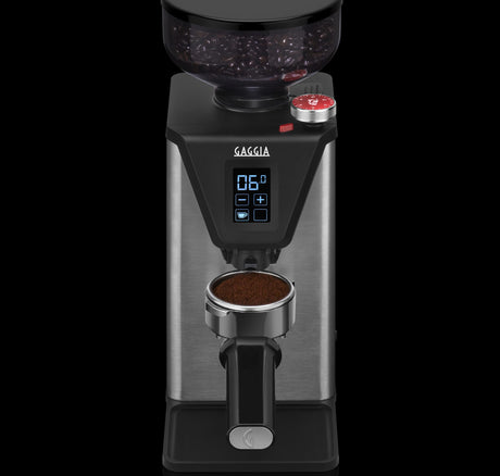 Gaggia MDF 55 grinder front view with a portafilter seated in the adjustable fork