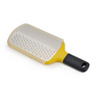 Joseph Joseph Multi-Grate paddle grater in yellow with coarse and fine blades and a sheath.
