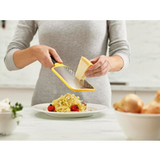 Yellow Joseph Joseph Multi-Grate paddle grater, fourth product view.