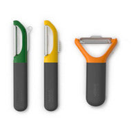 The yellow Multi-Peel serrated peeler shown with its blade guard.