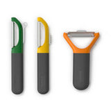 The yellow Multi-Peel serrated peeler shown with its blade guard.