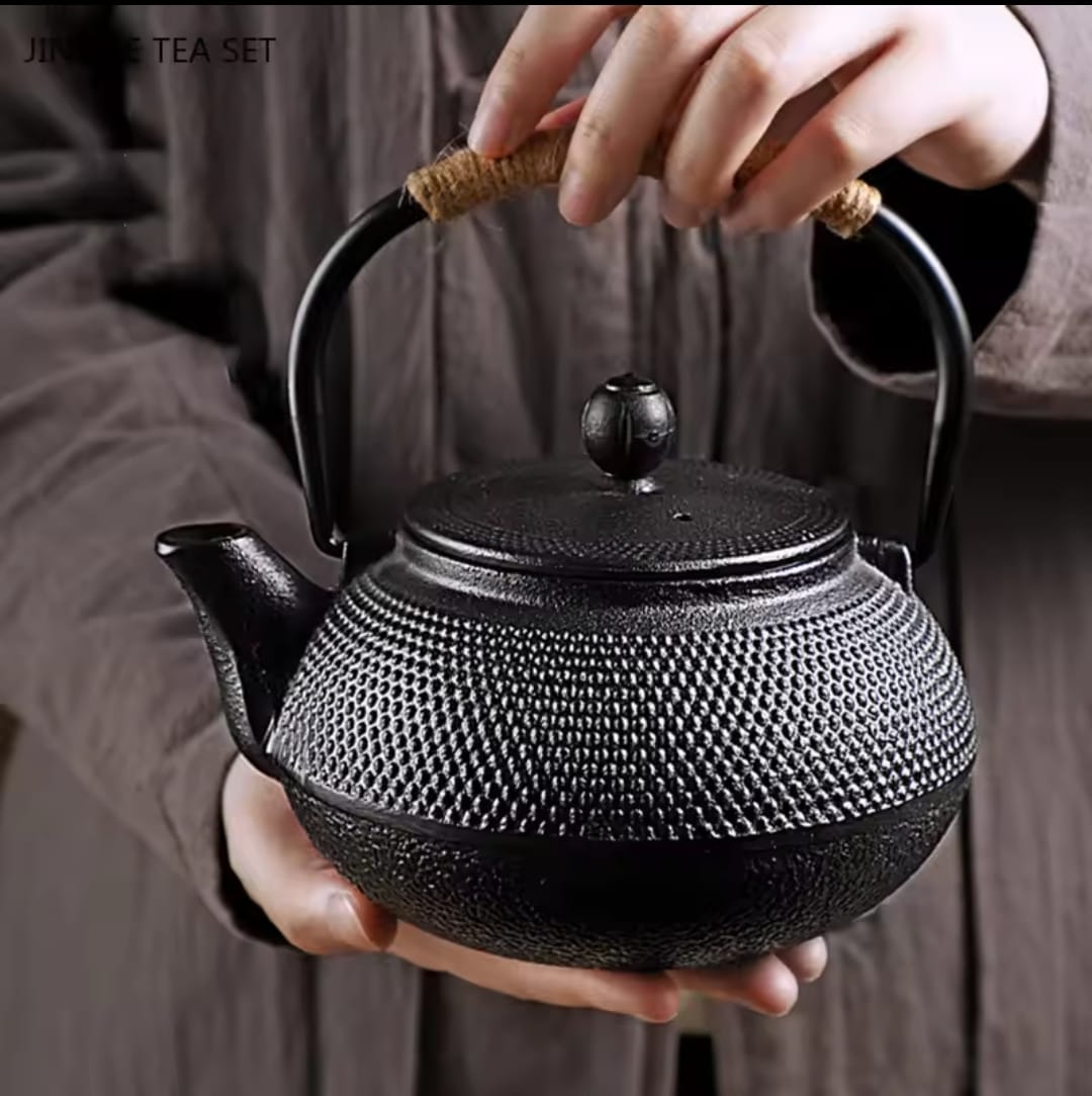 Original heavy duty cast iron tea pot with infuser, cast iron coaster and spoon