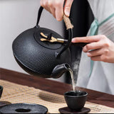 Original heavy duty cast iron tea pot with infuser, cast iron coaster and spoon