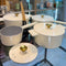 14 piece cast aluminium non-stick cookware set in cream with cast lids