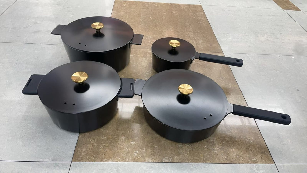 14 piece cast aluminium non-stick cookware set in black with cast lids