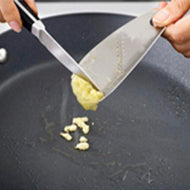 Joseph Joseph Shred-Line garlic and ginger grater in stainless steel, third product view.