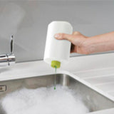 Further product view of the Joseph Joseph SinkBase Plus sink caddy set in white and green.