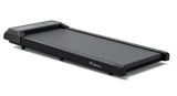 Slim black T21 walking pad treadmill lying flat, ready to slide under a desk
