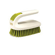 Joseph Joseph TwinScrub 2-in-1 scrubbing brush in green and white.