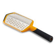 Joseph Joseph Twist grater in orange with extra coarse and ribbon blades and a storage sheath.