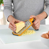 Joseph Joseph Twist grater showing its extra coarse and ribbon blades, third product view.