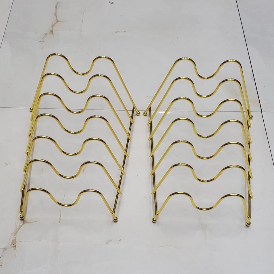 Metallic golden plates stand