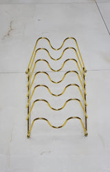 Metallic golden plates stand