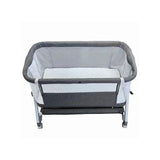 Baby co-sleeper with adjustable height.