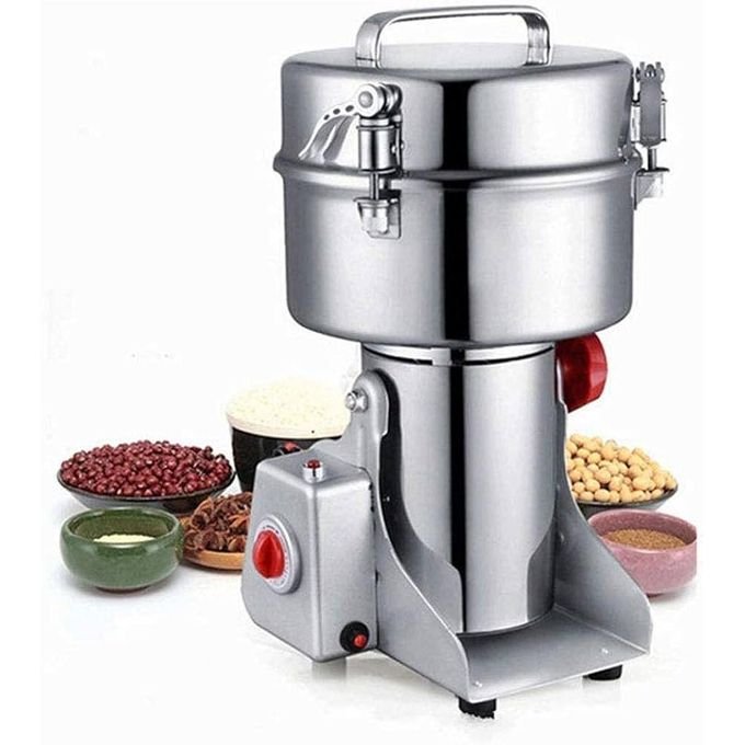 Mini kisiagi grain grinder side view showing stainless steel chamber, lid clamps and switch