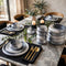 Swirl glass dinner set 18 piece in grey, frosted ombre plates and bowls on a dining table