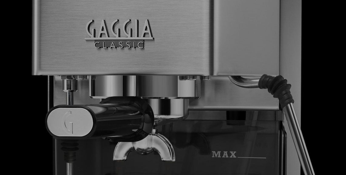 Gaggia Classic E24 stainless steel espresso machine showing the portafilter, steam wand and rocker switches