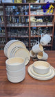 16pcs Elegant Reactive Glazed White Embossed Stoneware Set Transform Your Dining Table