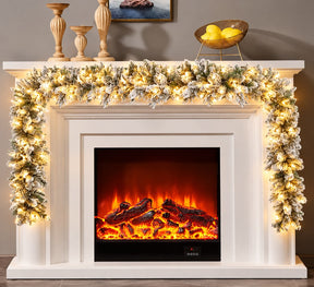 Snow flocked Christmas garland with built in warm white lights, 2.7m, on a fireplace mantel